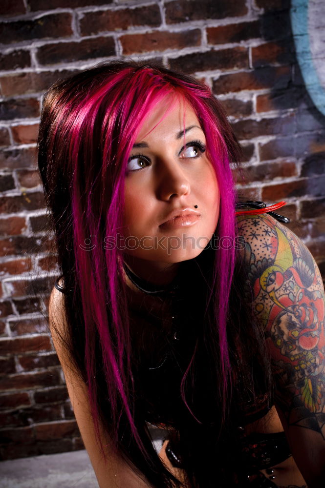 Similar – analog rectangular portrait of young woman with purple hair in front of green steel sheet wall