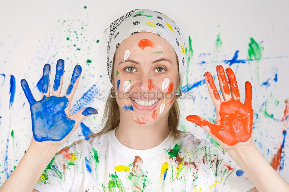 Similar – Young cute woman with paint in her face