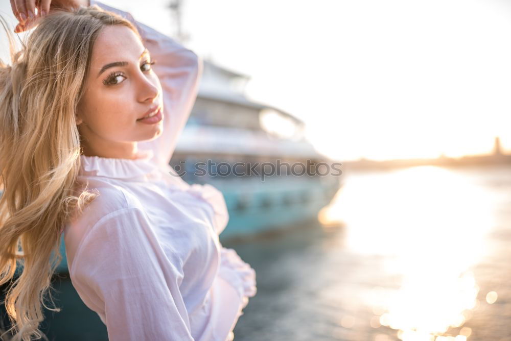 Similar – Young dreamy woman at seaside