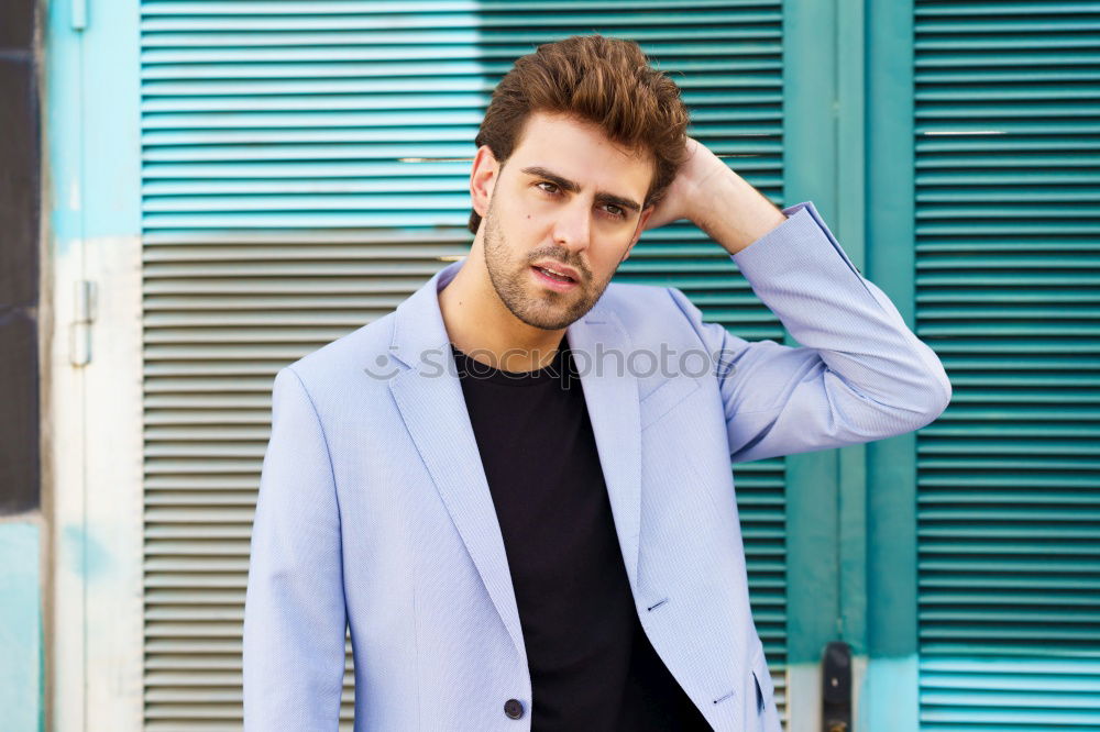 Similar – Image, Stock Photo Young bearded man looking away outdoors