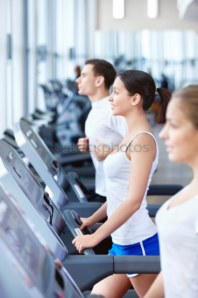 Similar – Image, Stock Photo People running over treadmill in a training session