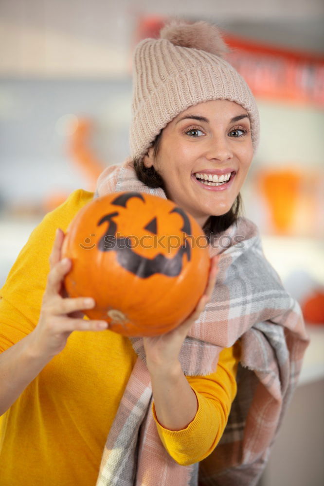 Similar – Image, Stock Photo Little girl holding a pumpkin in her hands, on Halloween.