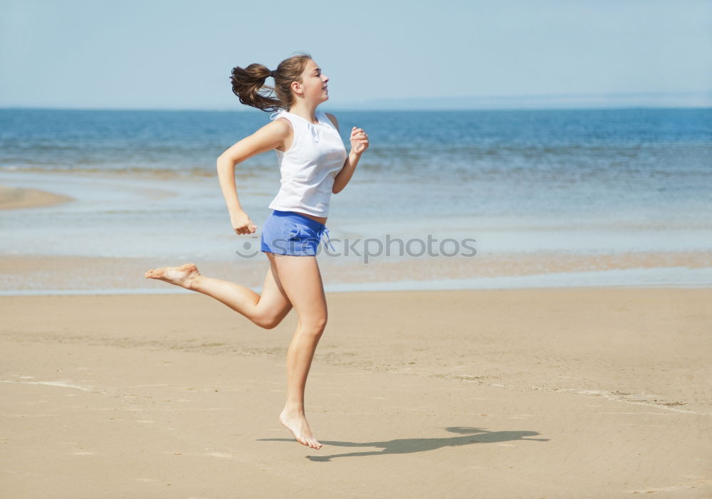 Similar – two sisters playing on the beach