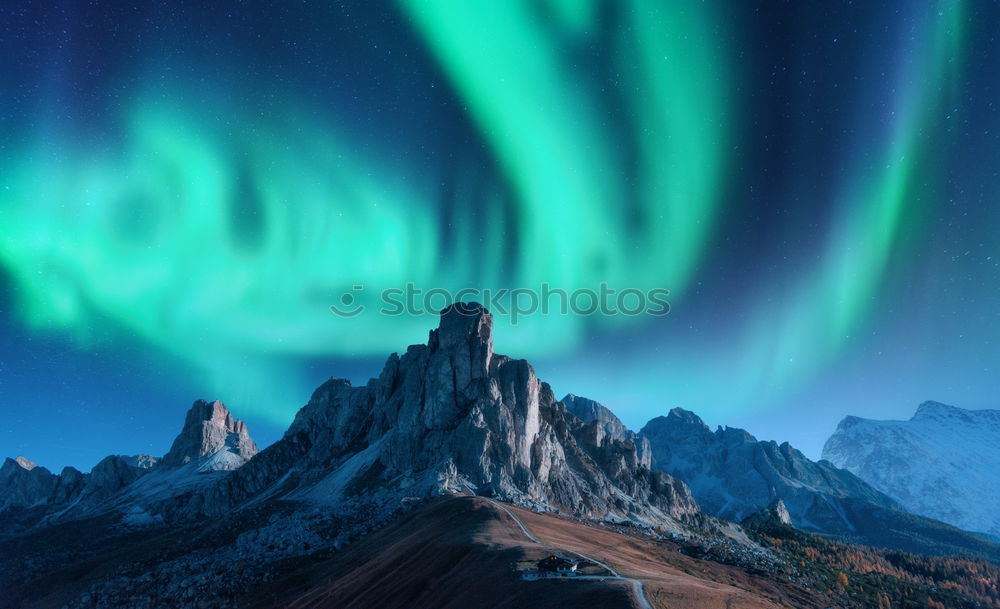 Similar – Norwegian mountain panorama with northern lights