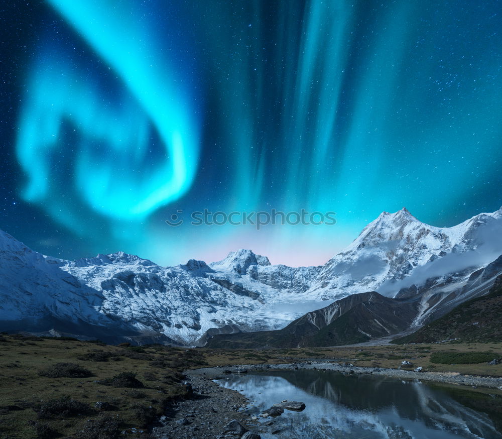 Similar – Norwegian mountain panorama with northern lights