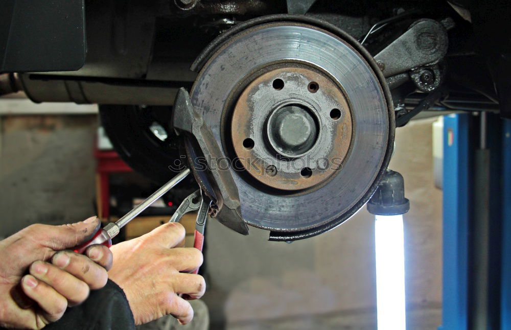 Similar – Man working on bike in shop