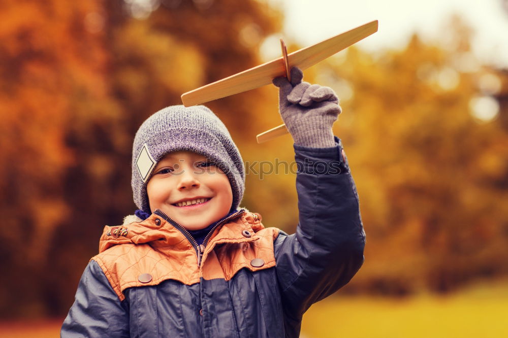 Similar – Image, Stock Photo Beautiful child with a yellow vest in the forest in autumn