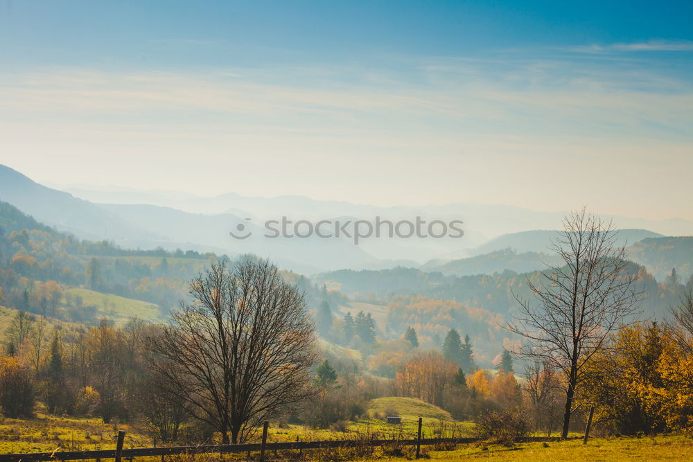 Similar – Slovakia autumn sunny morning panorama. Village in valley.