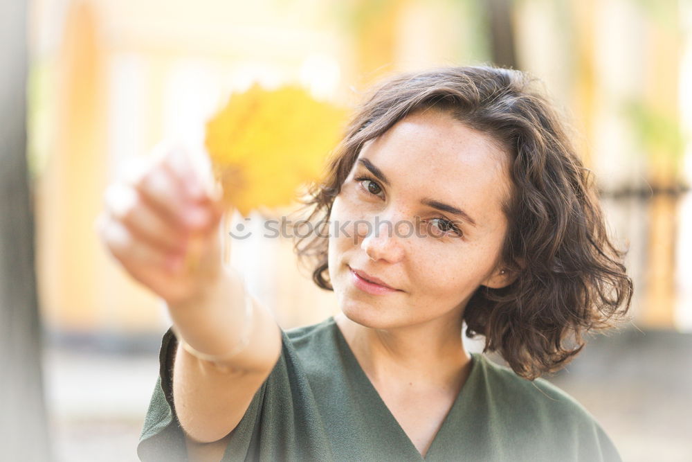 Similar – Image, Stock Photo Young florist packs a wreath of flowers