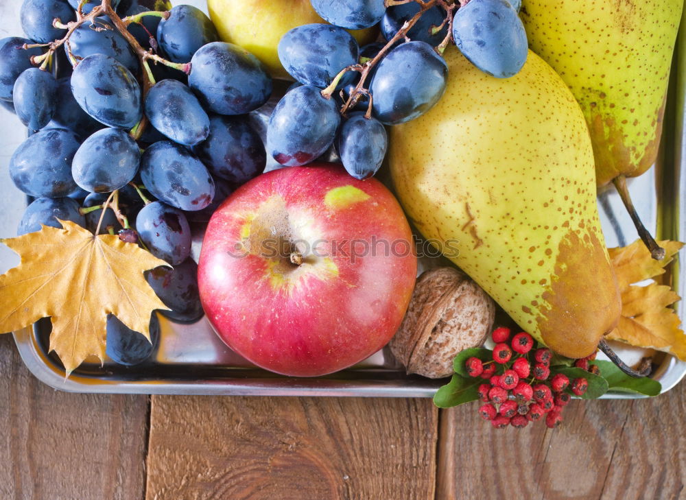 Similar – Mixed fruits on a rustic wooden table