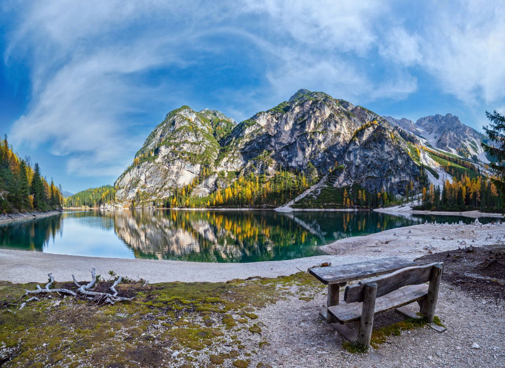 Similar – Mountain lake, woman standing