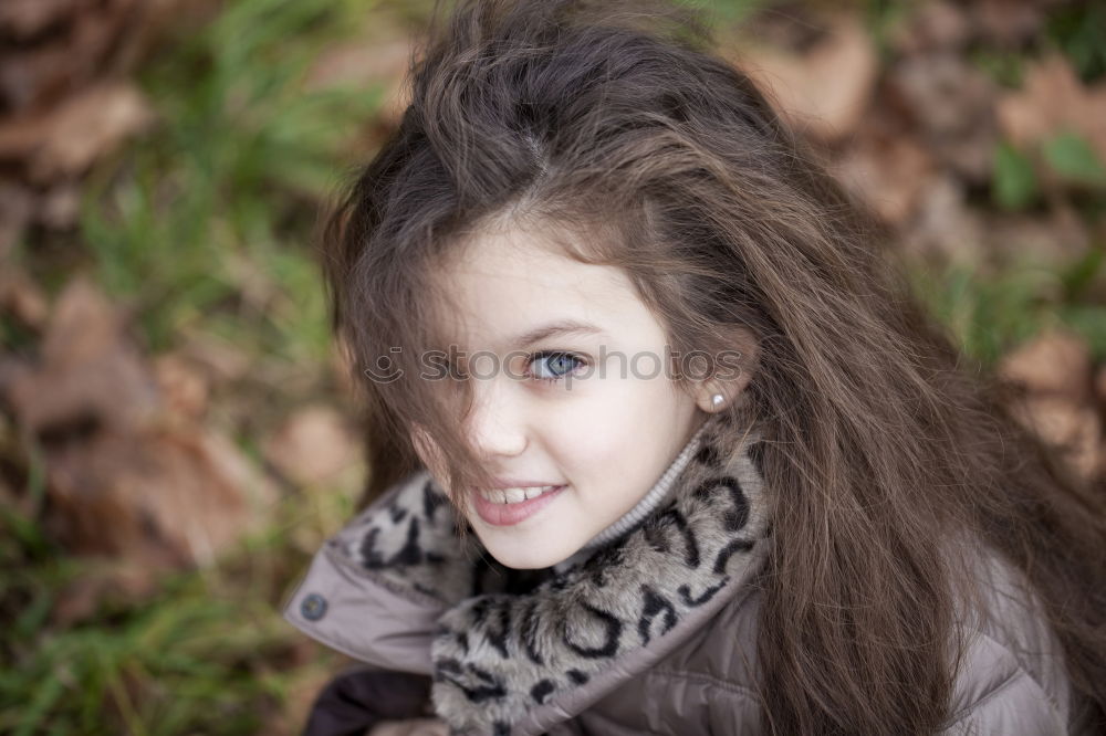 Similar – Image, Stock Photo Pretty girl with wool hat in a park