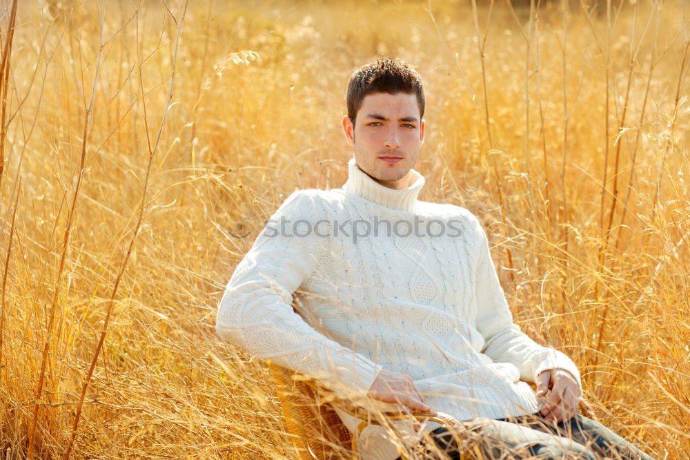 Image, Stock Photo Young man in a sunny autumn day