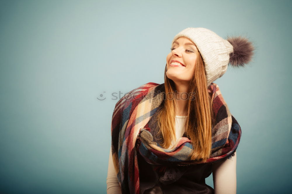 Similar – Young blonde long haired woman in winter coat with fur