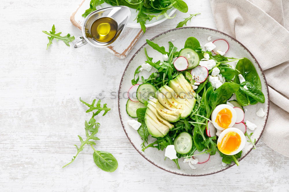 Similar – Empty plates and ingredients for spinach dishes