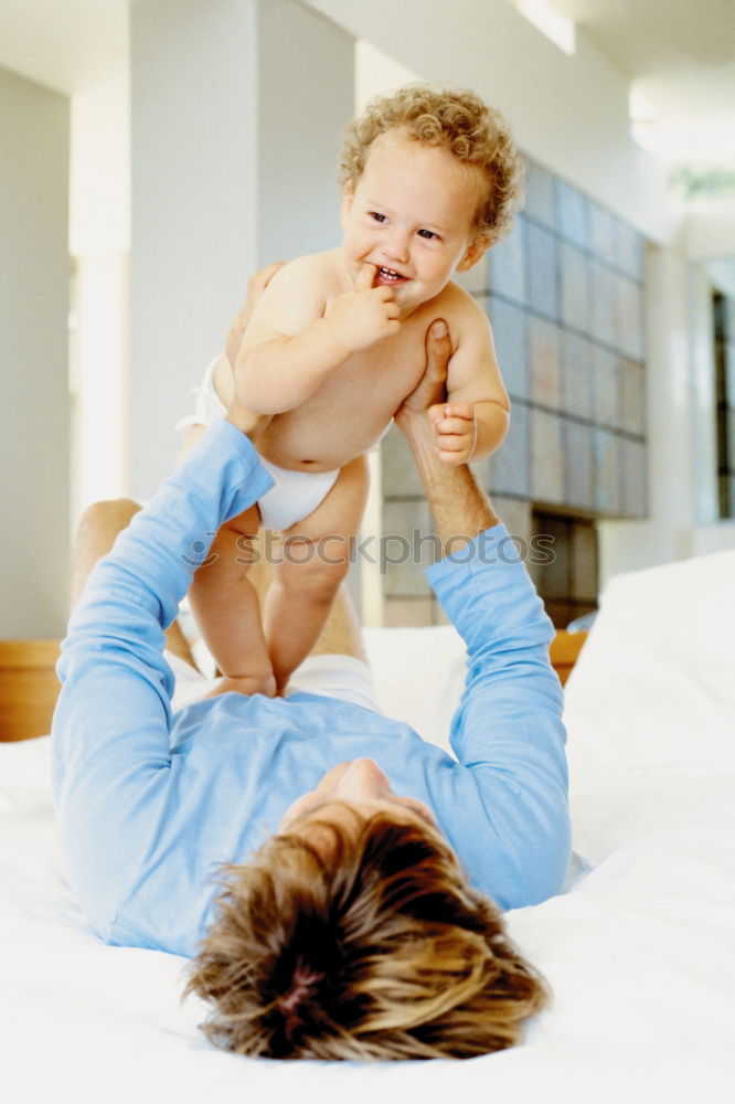 Similar – Image, Stock Photo Happy Mother tickling her cute toddler son at home