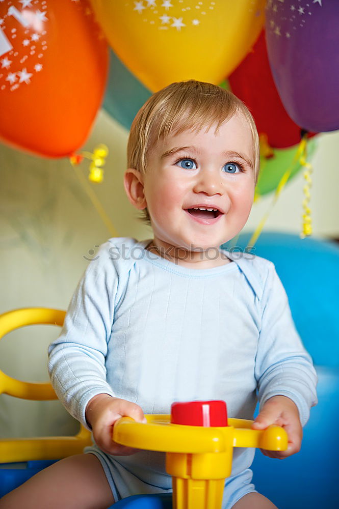 Image, Stock Photo Happy baby playing with toy blocks.