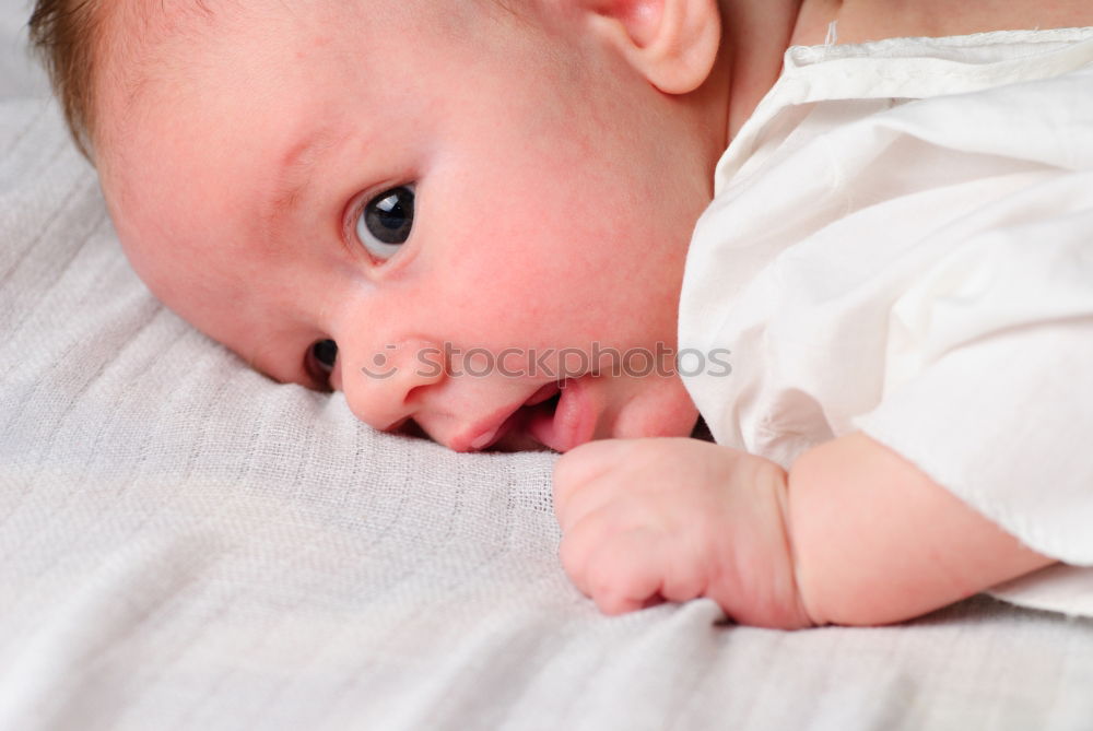 Similar – Portrait of a crawling baby on the bed in his room