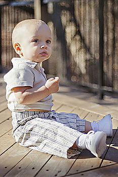 Similar – Image, Stock Photo Portrait of a three year-old boy sitting on the curb and looking left