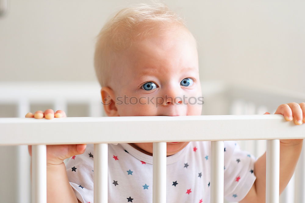 Image, Stock Photo Low Section Of Baby Girl Standing On Crib At Home