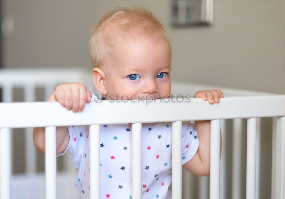 Similar – Image, Stock Photo Low Section Of Baby Girl Standing On Crib At Home