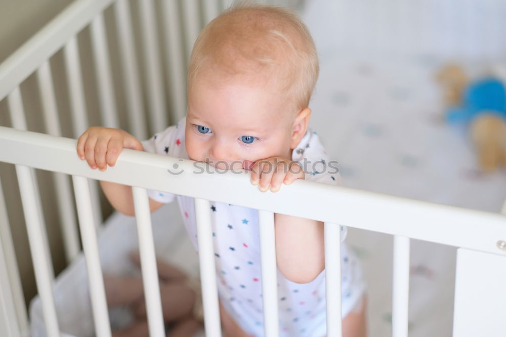 Similar – Image, Stock Photo Low Section Of Baby Girl Standing On Crib At Home