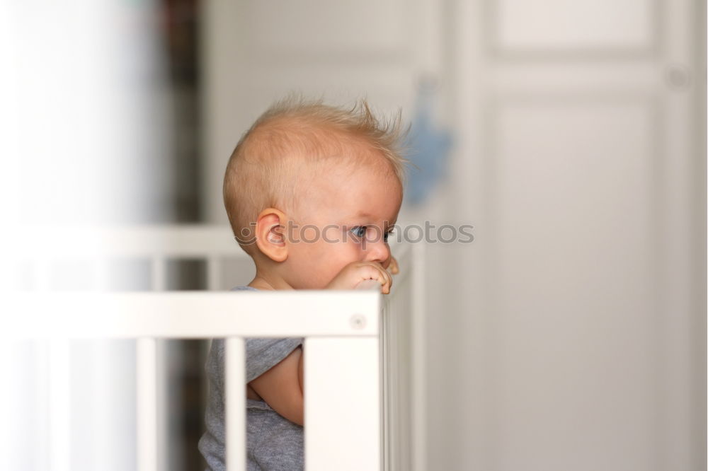 Similar – Image, Stock Photo Low Section Of Baby Girl Standing On Crib At Home