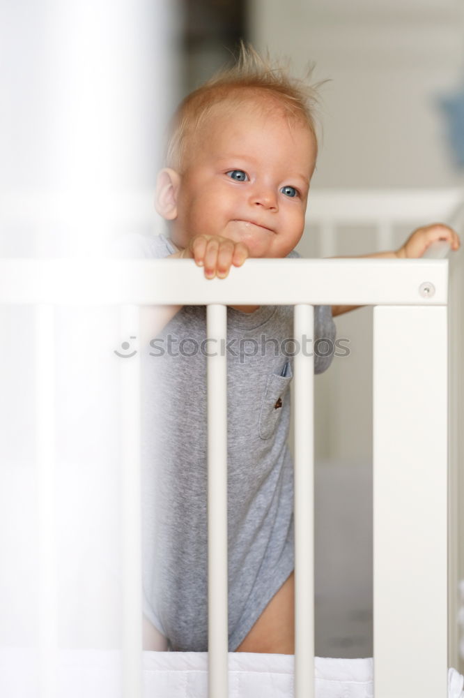 Similar – Cute Baby Girl Lying in the Crib