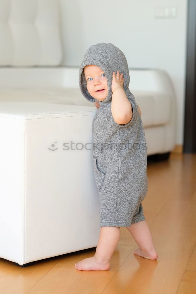 Similar – Image, Stock Photo 6 month old baby seated in high chair reaching into bowl of banana pieces; baby led weaning method