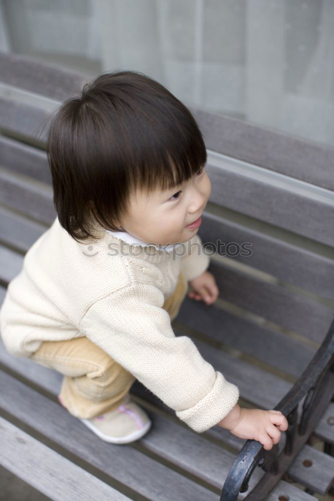 Similar – Image, Stock Photo Beautiful baby playing with her toys at carriage in a walk at park