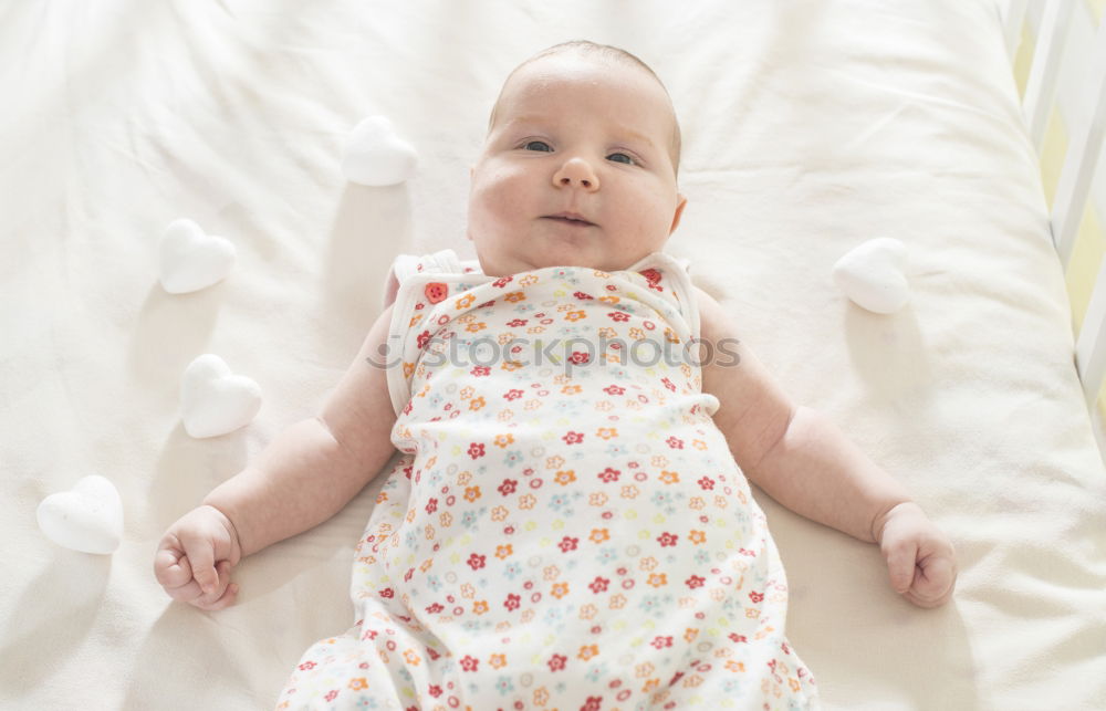 Similar – Cute Baby Girl Lying in the Crib