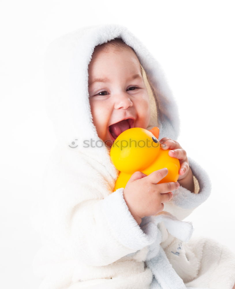 Similar – Image, Stock Photo baby eating an orange on blue background