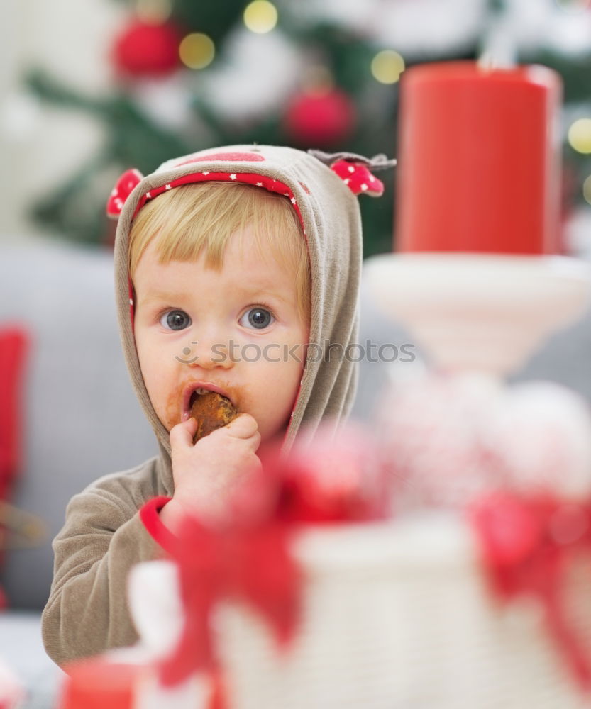 Similar – Mother and son decorating Christmas biscuits at home