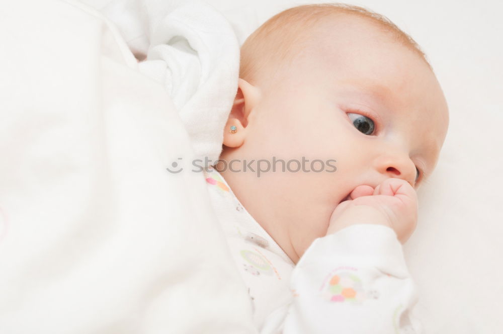 Similar – Baby taking feeding bottle