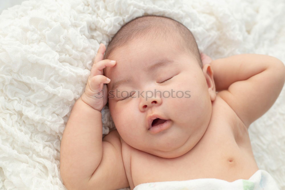 Similar – Newborn baby girl sleeping