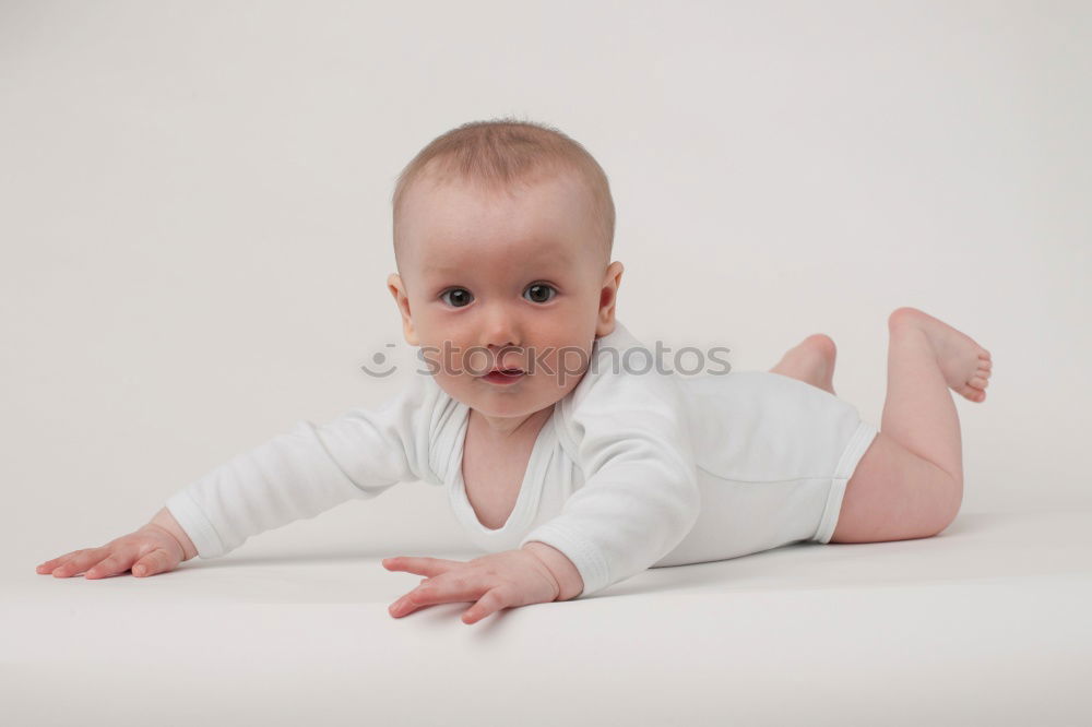 Similar – Cute Baby Girl Lying in the Crib