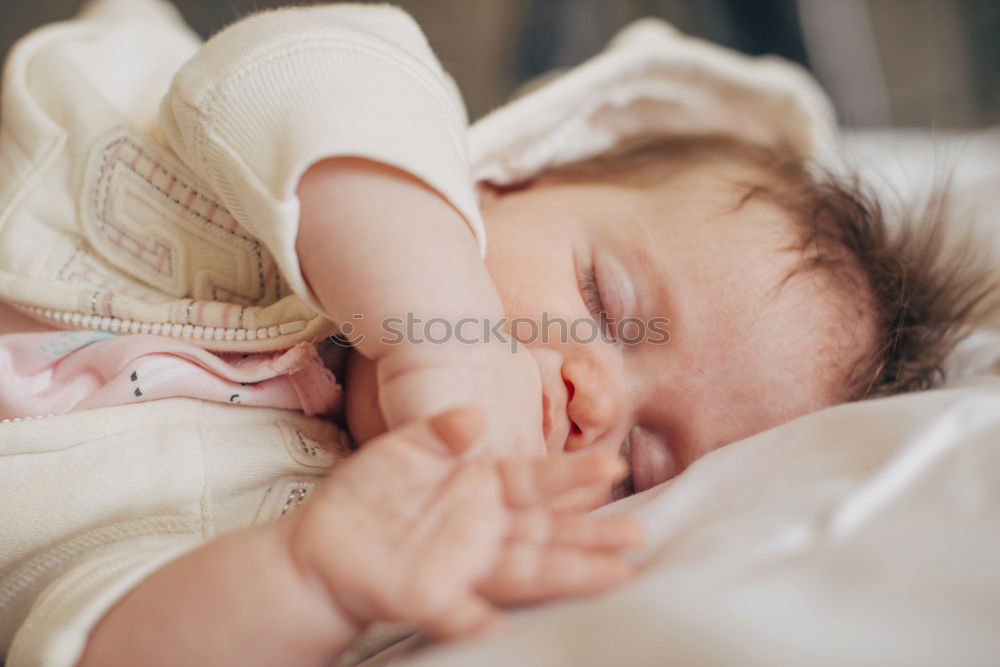 Similar – Portrait of a newborn baby sleeping