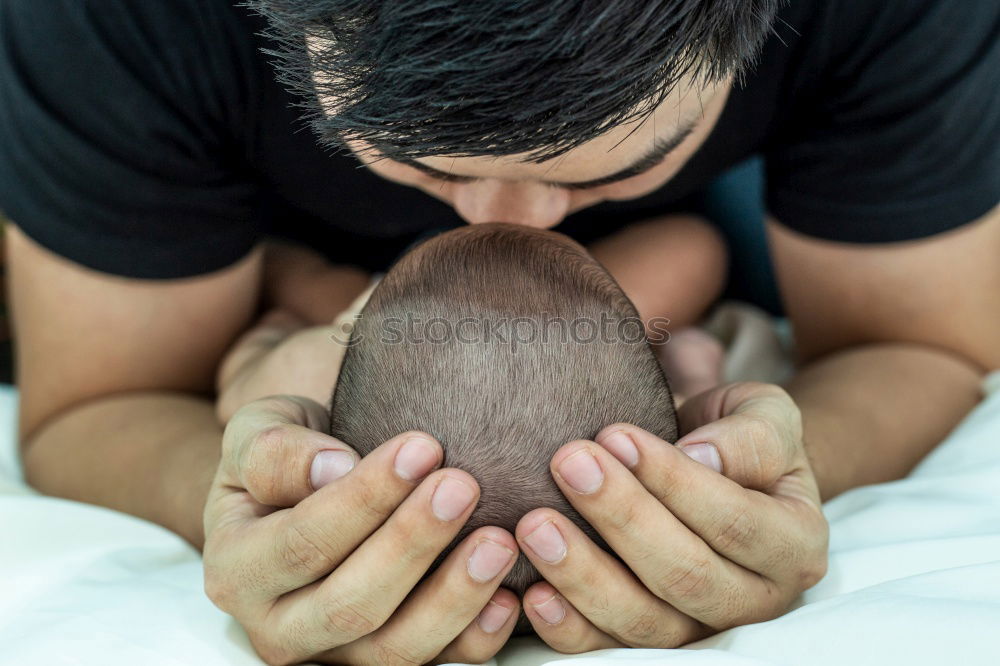 Similar – Image, Stock Photo Mother holding newborn baby son at the day time. Concept of happy family.