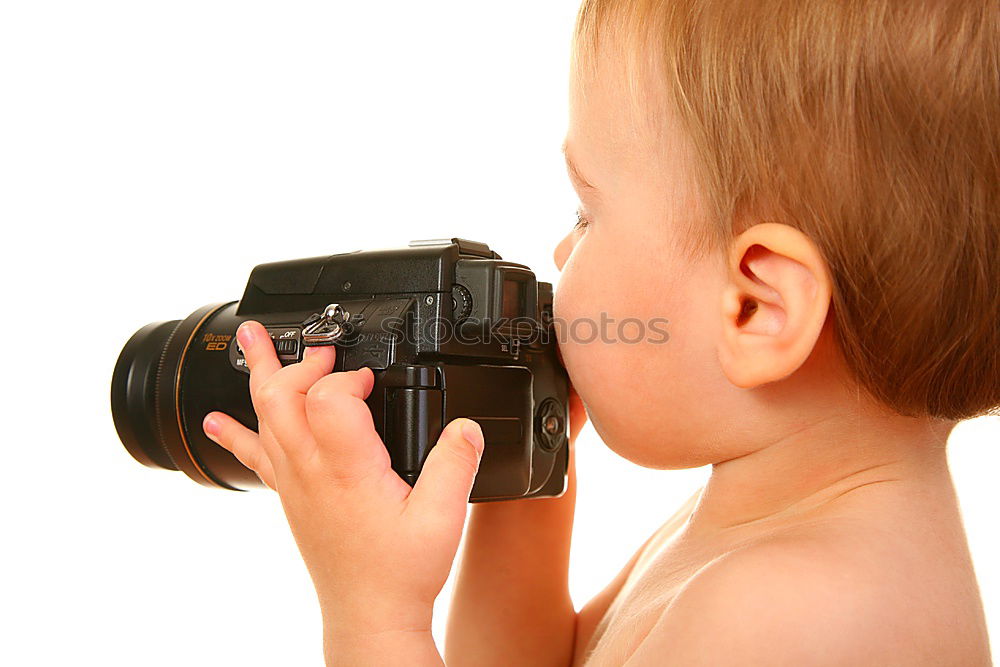 Similar – WOMAN WITH ANALOG CAMERA I