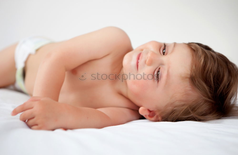 Baby with one years old getting out of bed