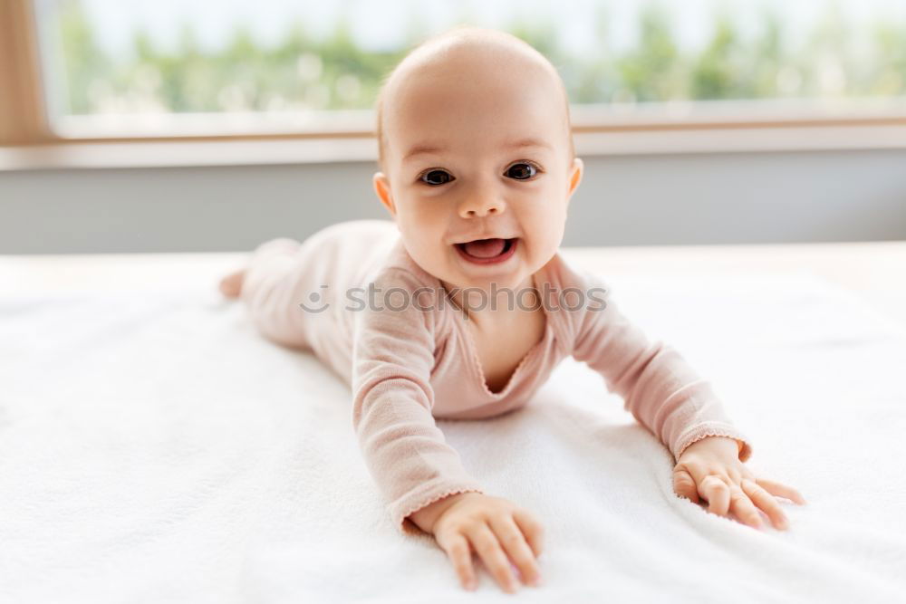 Similar – Cute Baby Girl Lying in the Crib