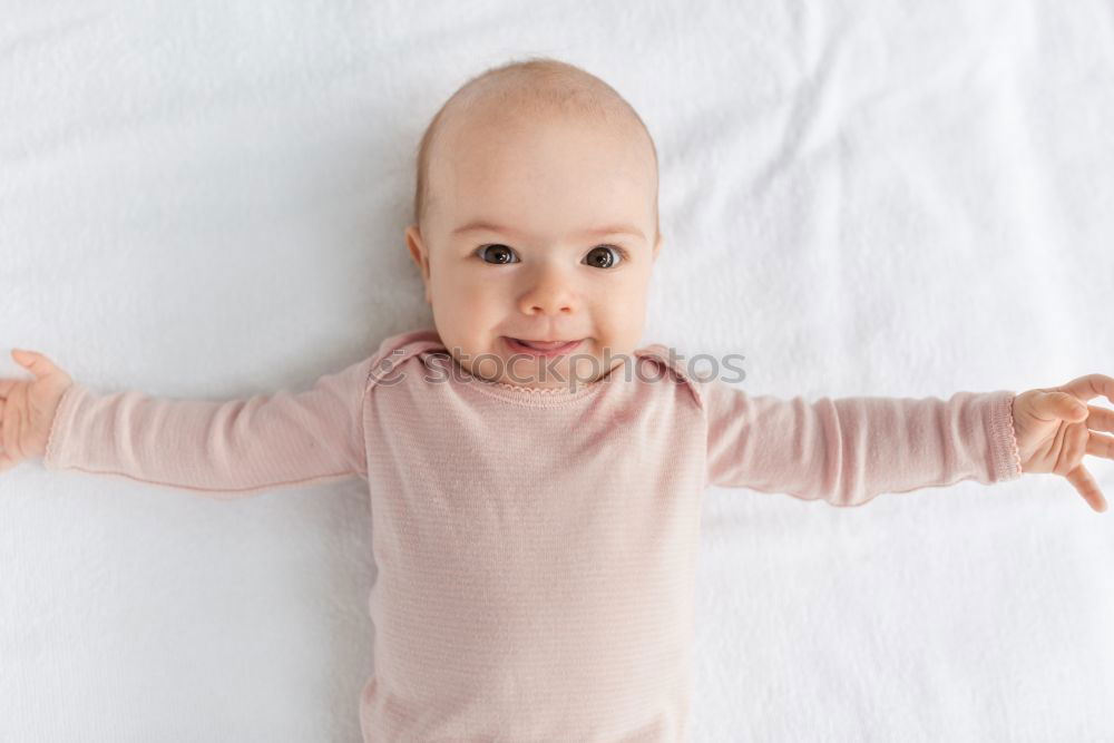 Similar – Cute Baby Girl Lying in the Crib