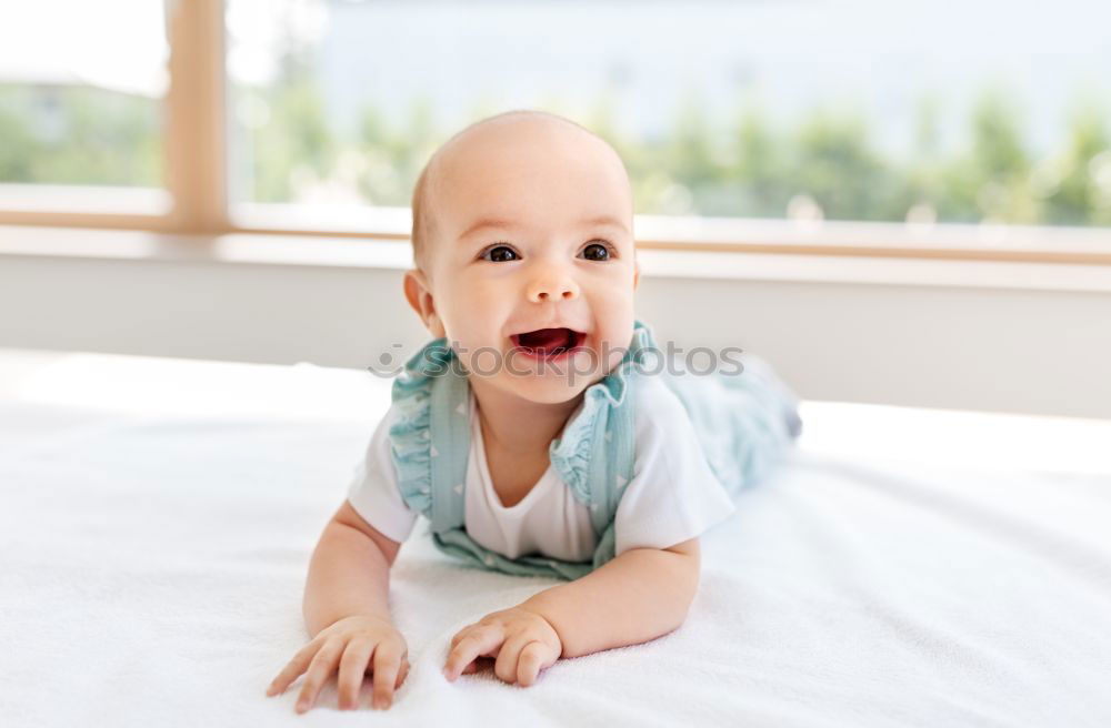 Similar – Cute Baby Girl Lying in the Crib