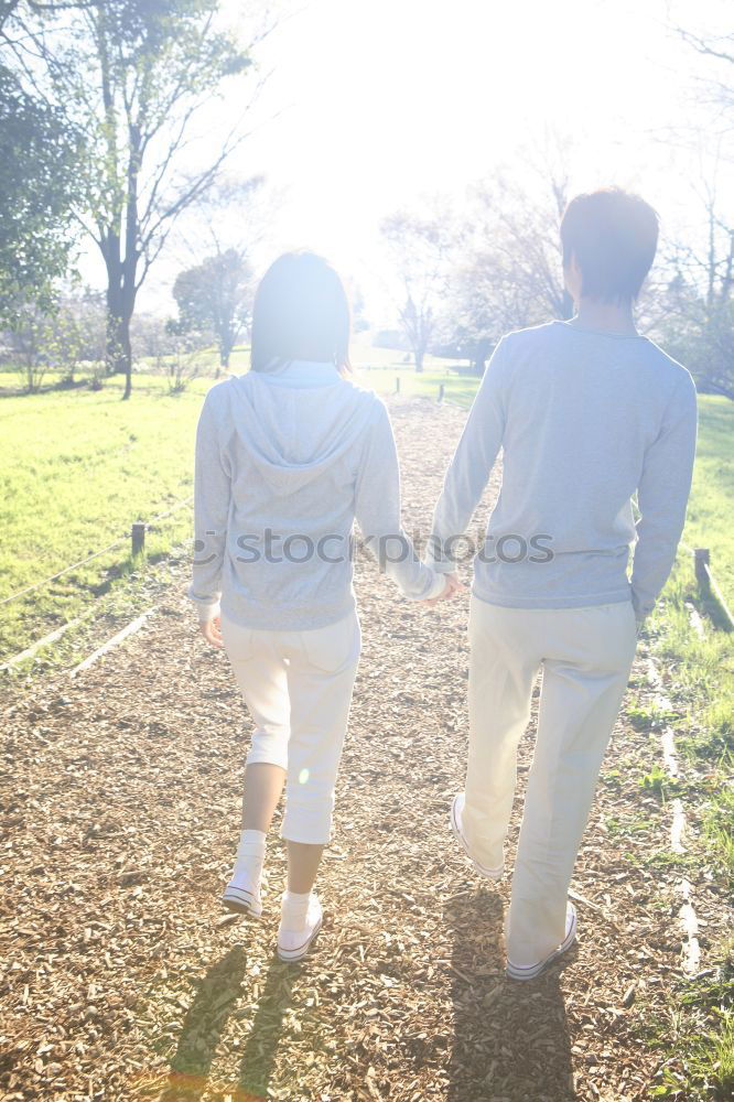 Similar – Image, Stock Photo Child holding hand of senior man in the nature