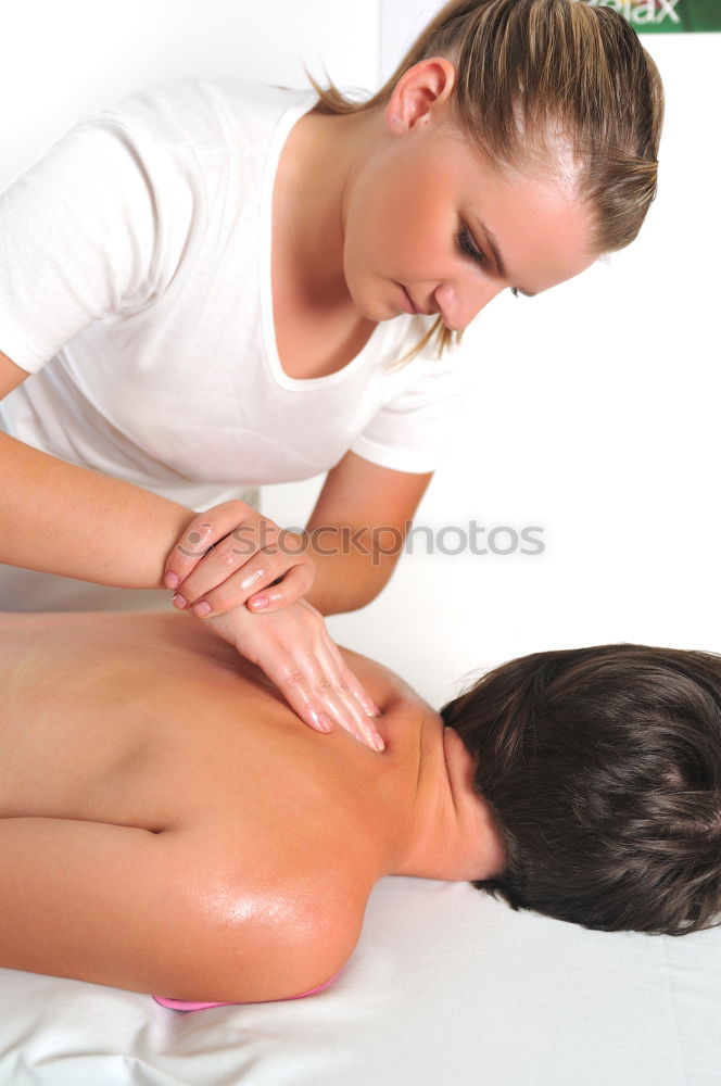 Similar – Young man having massage in spa