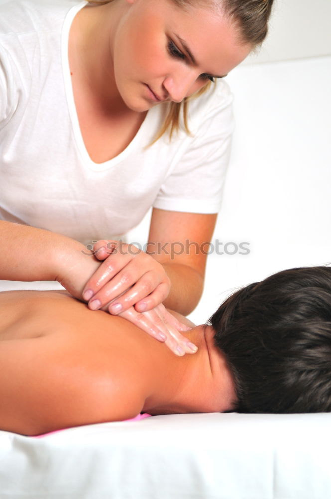 Similar – Young man having massage in spa