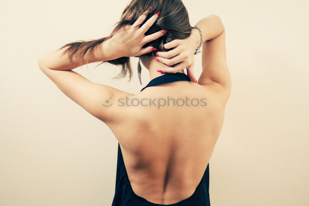 Similar – Analogue (6×6) back portrait of young woman with long brunette hair tied into a braid