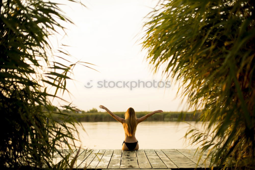 Similar – Summer feet at the lake