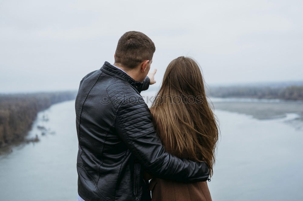 Similar – Women standing at lake