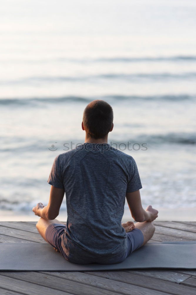 Similar – Image, Stock Photo Young woman practicing yoga by sea